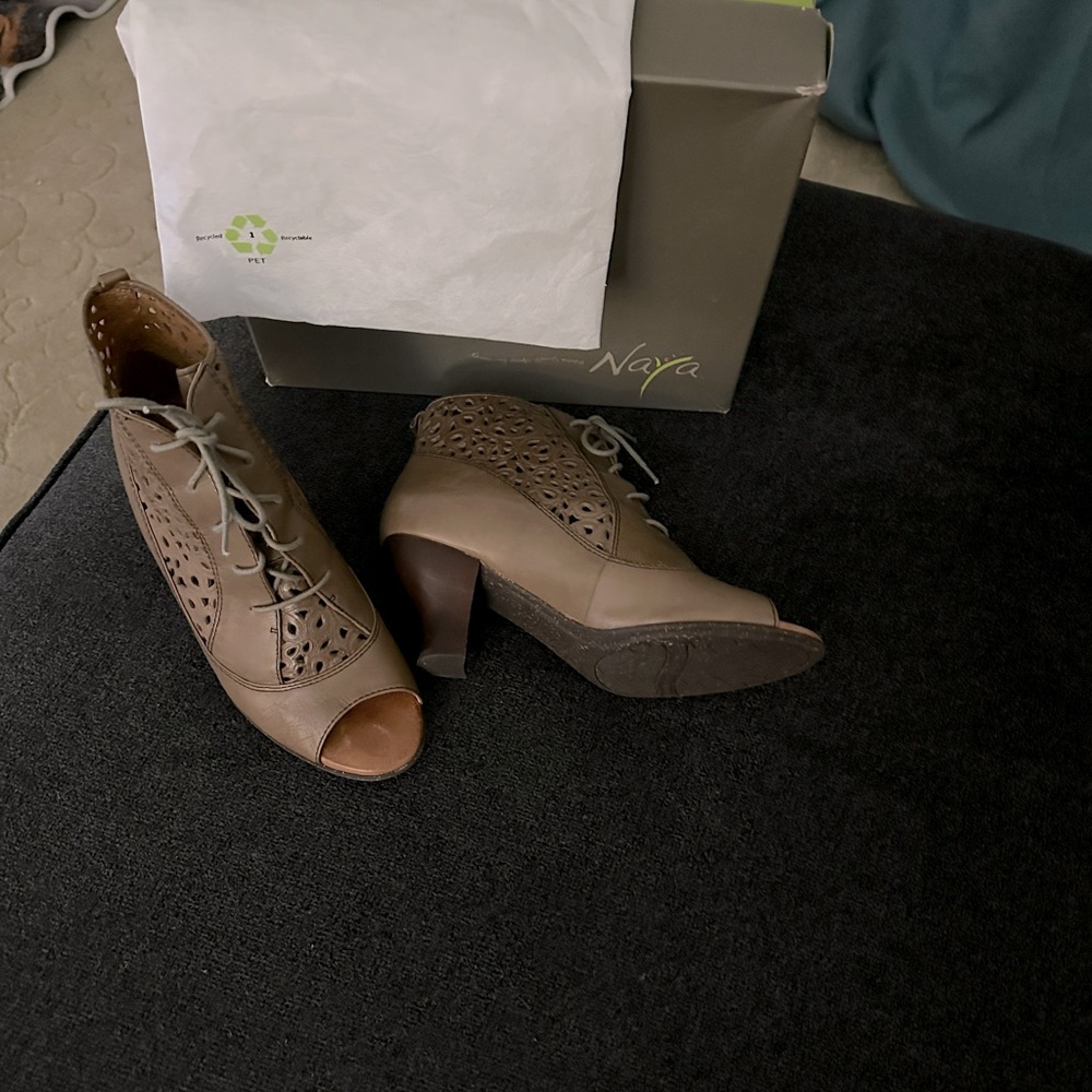 All leather ankle boot with peep toe. Soft leather. Like new.